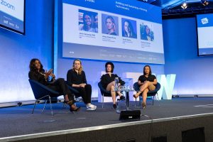 people sitting on a stage