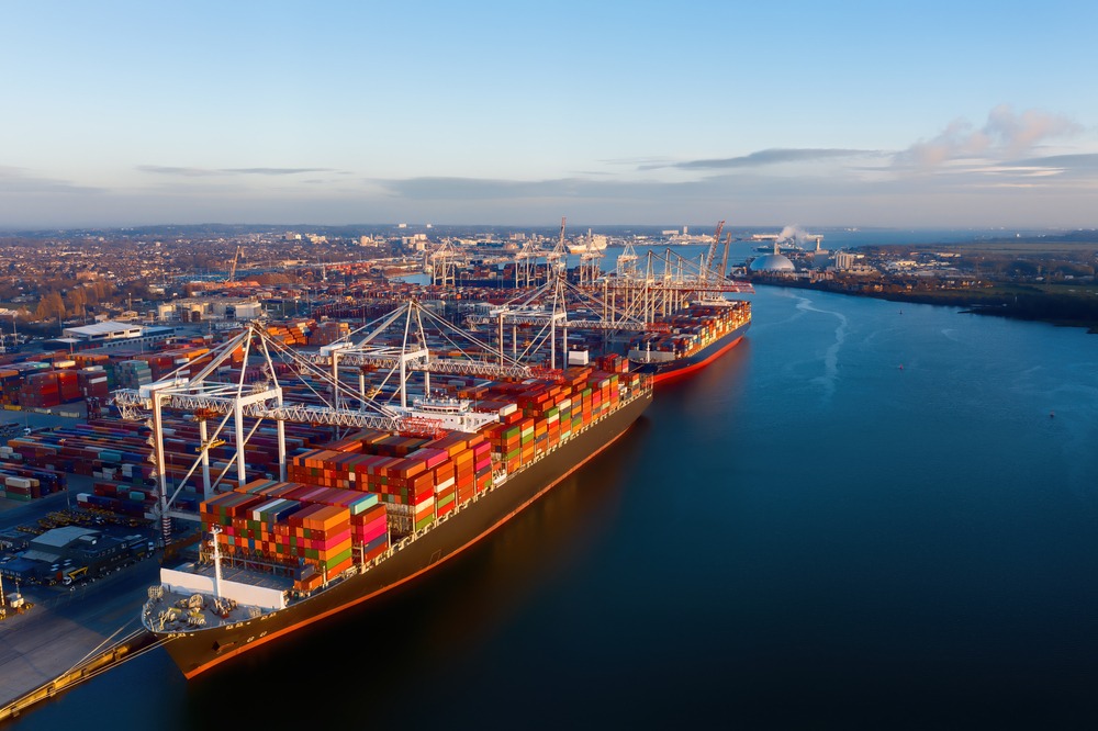 Aerial,View,Of,Colorful,Containers,On,Cargo,Ships,At,The